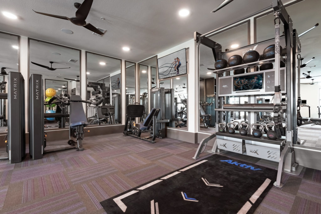 Fitness studio with strength and cardio equipment, yoga and spin cycle studio - Maintain Your Active Lifestyle
