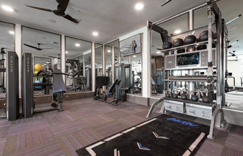 A Better Way to Live - Fitness studio with strength and cardio equipment, yoga, and spin cycle studio